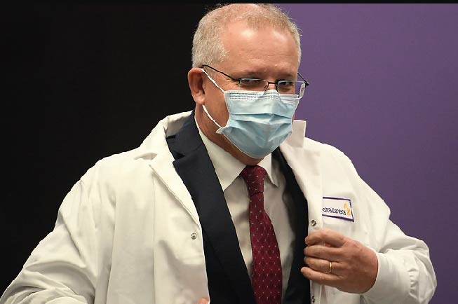 image-scott-morrison-says-a-coronavirus-vaccine-would-be-as-mandatory-as-you-can-possibly-make-it